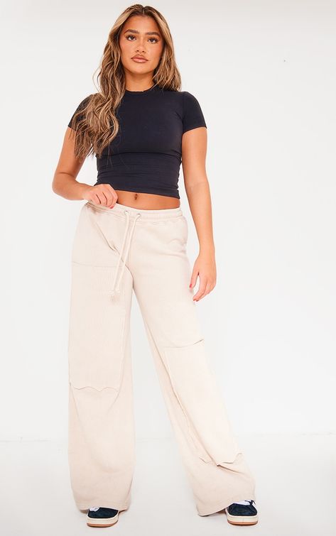 Take on those chilled days in style with these stone loopback rib patch wide leg joggers. Brought to you in a stone material with a loopback detail and a rib patch design, what's not to love Its wide leg fit is all you need to bring the edge to your outfit of the day. Team with a pair of trainers and your fave crop top for a fool proof finish.   Length approx 78cm/30.5 (Based on a sample size UK 8)   Model wears size UK 8/ EU 36/ AUS 8/ US 4 Beige Joggers Outfit Women, Sweatpants And Crop Top Outfits, Wide Leg Joggers Outfit, Joggers Outfit Women, Lounge Trousers, Wide Leg Joggers, Lounge Pants Womens, Sweatpants Outfit, Wide Leg Sweatpants