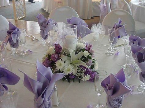 purple low centerpiece w/candle Purple Candle Centerpieces, Romantic Wedding Flowers Centerpieces, Floral Candle Centerpieces, Wedding Table Centerpieces Purple, Purple Wedding Tables, Centerpiece For Wedding, Purple Wedding Centerpieces, Purple Wedding Decorations, Purple Centerpieces