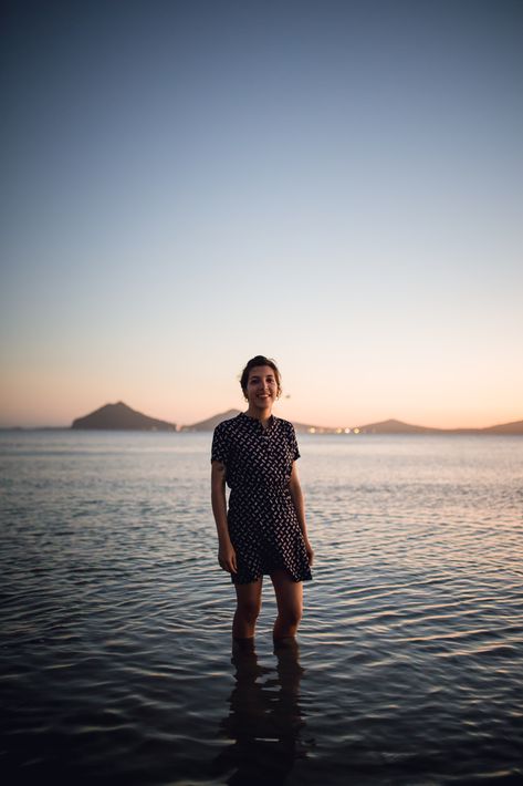 Woman wearing a dress, is standing in the waters, in the sunrise in summer, with mountains in the background Person Standing In Water, Woman Standing In Water, Standing In Water, Water Art, The Sunrise, Person Standing, Woman Standing, Summer Adventures, Model Release