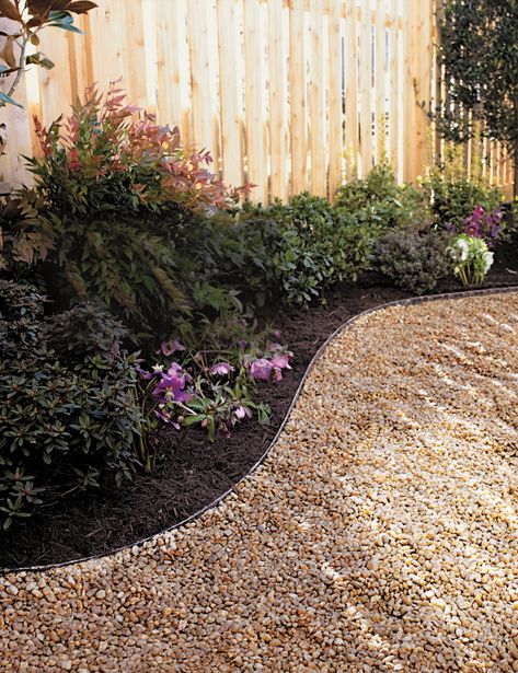 What does it take to make a walkway in a weekend? Edging, gravel and elbow grease Gravel Walkway, Gravel Pathway, Pea Gravel Patio, Gravel Landscaping, Backyard Walkway, Jardim Diy, Gravel Patio, Cheap Backyard, Gravel Path