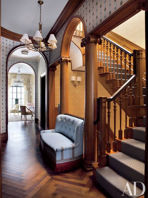 Architect Peter Pennoyer added columns and classical details to the staircase and landing of a New York City townhouse decorated by Jeffrey Bilhuber. Read on for more chevron and herringbone floors. Peter Pennoyer, Jeffrey Bilhuber, Townhouse Decorating, New York Townhouse, Herringbone Flooring, Townhouse Interior, Traditional Staircase, Interior Columns, Herringbone Floor