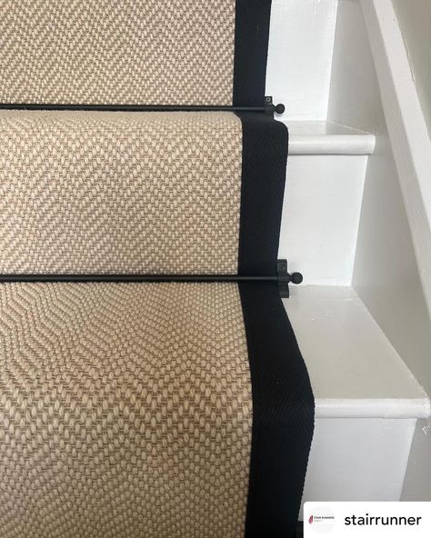 Definitely one of our best sellers! Fibre Flooring Chalk herringbone with black border @fibreflooring @jaspa_binding_tapes stair runner and landing carpet. Black jubilee stair rods @stairrods_uk #stairs #stairrunner #carpet #stairrods #stairrunners Trim On Carpeted Stairs, Black Stairs With Runner, Fibre Flooring, Landing Carpet, Herringbone Stair Runner, Entry Coat Rack, Bars Ideas, Black Stairs, Stair Rods