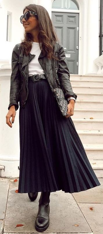 Winter Outfits With Pleated Skirts, Black Leather Jacket With Skirt, Black A Line Skirt Outfit Winter, Pleated Skirt Leather Jacket Outfit, Long Black Pleated Skirt Outfit Winter, Black Pleated Skirt Fall Outfit, Long Grey Skirt Outfit Aesthetic, Black Accordion Skirt Outfit, Plisse Skirt Outfit Winter