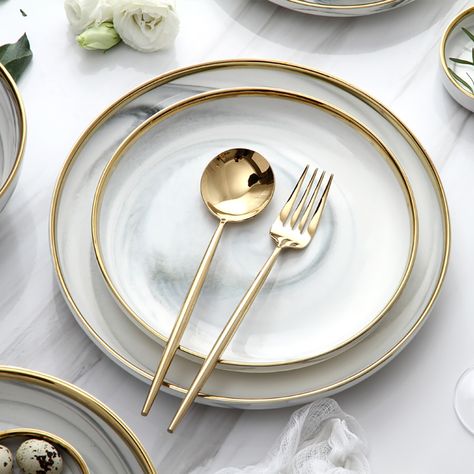 Have a good time with your families and friends and enjoy good food with these distinct 18-piece dinnerware sets. Gold rim design and delicate marble pattern are a great combination for adding exquisite modern appeal to your tablescape. It includes dinner plates, bowls, spoons, and so on. Crafted from premium ceramic, it allows a timeless look and beauty. Modern Dining Plate Set, Dinner Sets Dinnerware Tableware, Kitchen Bowls Set, Plates Setting Ideas, Elegant Plates Sets, Modern Kitchen Plates, White And Gold Dinnerware, Dinner Service Set, Spoon Design Ideas