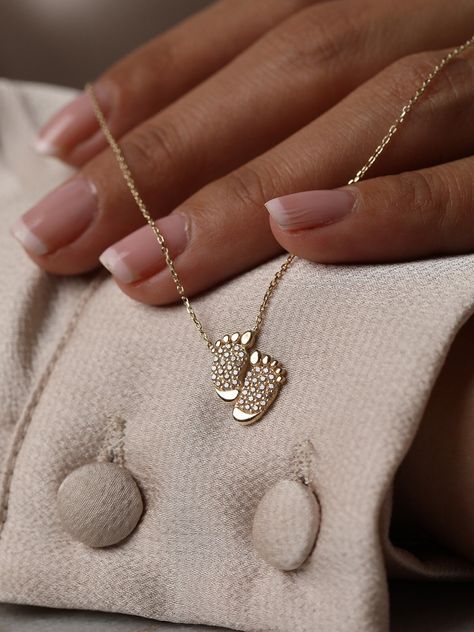 "14K Gold Baby Feet Necklace, Cz Diamond New Mom Necklace Gift, Gold Baby Footprints,Mom and Baby jewelry,Gift For New Mom, Baby shower Gifts This adorable mother-Baby necklace is the perfect gift for a new mom. ♥Let a new mom's pride shine with a mother-child necklace. Stunning, unique mother-baby necklace designs. This will be your new favorite everyday necklace. Super delicate, sparkly, and feminine. Wear it by itself, or mix and match it with our other necklaces. This necklace would make a g Jewelry For New Mom, Baby Jewelry Gold Newborn, Baby Gift Ideas Unique, Baby Necklace Gold, Gold Baby Jewelry, Moms Necklace, Gifts For Mom To Be, Gold Pendant Designs, Mom To Be Gifts