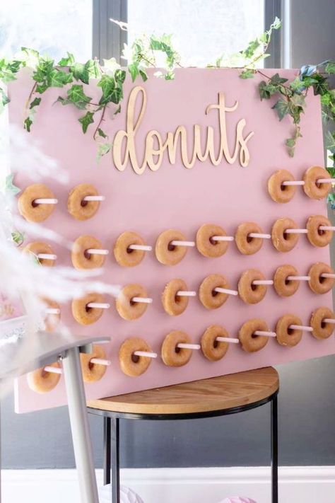 Fall in love with this fab Galentine's day party! The donut wall is so cool!! See more party ideas and share yours at Catchmyparty.com #catchmyparty #partyideas #galentines #gals #galentinesdayparty #galentinesday #donutwall Pink Donut Wall, Senior Breakfast, Day Party Ideas, Holiday Soiree, Birthday Donuts, Heart Cakes, Rustic Party, Donut Wall, Bridal Shower Inspiration