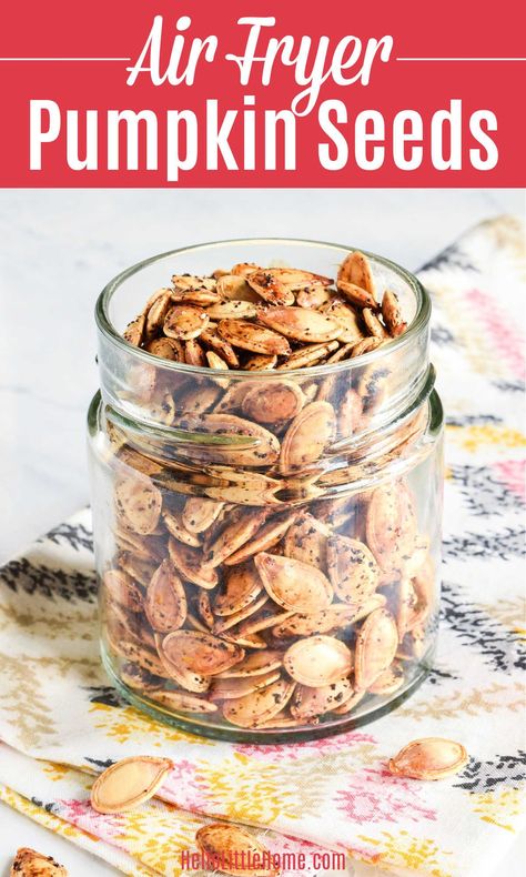 Looking for Fall Snack Ideas? You’ll love these delicious Air Fryer Pumpkin Seeds! Learn how to make the BEST Roasted Pumpkin Seeds in the Air Fryer using simple ingredients: raw pumpkin seeds, olive oil, salt, seasonings (like cinnamon sugar, garlic, other spices). This homemade Air Fried Pumpkin Seeds recipe is a tasty treat that’s crispy, crunchy, and easy to make. These healthy Air Fry Pumpkin Seeds are a great Vegetarian, Vegan, Dairy Free + Gluten Free snack recipe! | Hello Little Home Air Fried Pumpkin Seeds Recipe, Pumpkin Seed Air Fryer Recipe, Pumpkin Seeds In The Air Fryer, Homemade Roasted Pumpkin Seeds, How To Cook Pumpkin Seeds In Air Fryer, How To Roast Pumpkin Seeds In Air Fryer, Pumpkin Seeds Air Fryer Recipe, Home Made Pumpkin Seeds, Airfry Pumpkin Seed