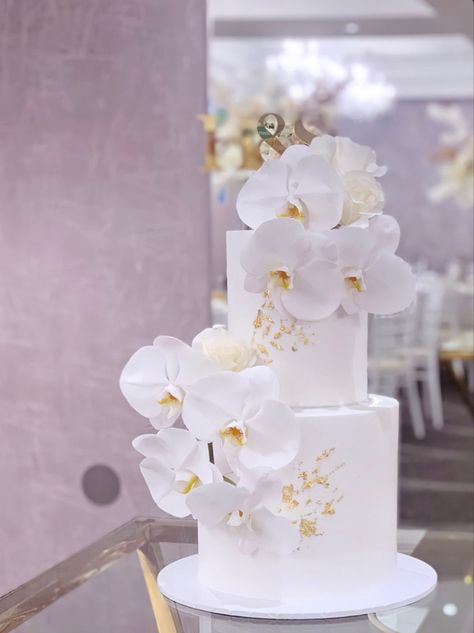 Gorgeous Wedding Cake Classy, Wedding Cake Orchids White, Modern Wedding Cake 2023, Simple Wedding Cake 2 Tier Flowers, Wedding Cakes With Orchids, Orchid Decoration Wedding, 2 Tier Wedding Cake With Flowers, Cake With Orchids, Iconic Cakes