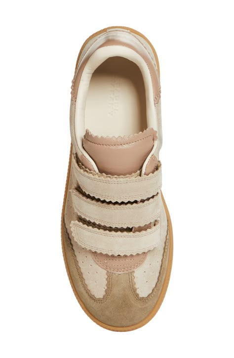 Smart pinking traces the contours of an easy-going sneaker styled with a low-top profile and dot perforations racing up the sides. Adjustable hook-and-loop straps Leather upper and lining/rubber sole Made in Portugal Women's Designer Shoes Neutral Sneakers Women, Designer Wishlist, Cream Sneakers, Cool Sneakers, Woman Sneakers, Cool Girl Style, Crochet Lace Edging, Shoe Inspo, Swag Shoes