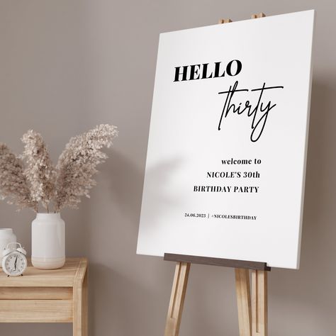 Thirty is the new twenty! Celebrate the big 3-0 with this classic modern 30th birthday party sign and selfie frame. The perfect addition to any party decor, this two piece set is the perfect way to welcome guests to your 'Hello Thirty' party. Crafted from high-quality foam board, our 30th Birthday Party Sign features a sleek and modern design that is perfect for any style of party. Our 30th Birthday Party Sign is easy to customise with your name. The age can be changed if required. It can be dis Classy 30th Birthday Decor, Formal 30th Birthday Party, 30th Birthday Signs Funny, Modern Birthday Party Decor, 30 Year Birthday For Him, Boujee 30th Birthday Party, 30th Birthday Party Decor For Women, 30th Party Decor, Simple 30th Birthday Decorations