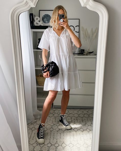 Converse cdg styled with a white smock dress - spring outfit idea @liketoknow.it #liketkit #LTKspring #LTKshoecrush http://liketk.it/2O9em White Smock Dress Outfit, White Converse Outfit Dress, High Top Converse And Dress, White Dress And Converse, Black Dress And Converse Outfit, White Dress With Converse, Dresses With Converse High Tops, Outfits With White Shoes, Converse And Dress Outfit