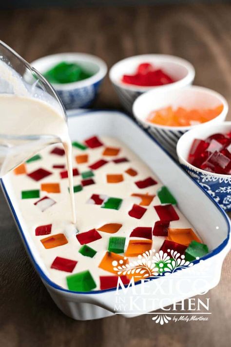 Learn how to make this recipe for your next family gathering or a fiesta. This Mexican jello is a delicious treat that's sure to please everyone's taste buds. Milk Jello Recipes Mexican, Mexican Jello Desserts, Tequila Shrimp Recipe, Mexican Jello, Mexican Chicken Salads, Jello Recipe, Popular Dessert, Jello Desserts, Mexican Dessert Recipes