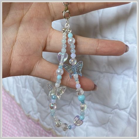 Get the perfect ring to complete your outfit on Amazon. Blue Phone Strap Beads, Phone Keychain Beads Aesthetic, Beads Charm Phone, Blue Phone Charm Ideas, Cute Keychain For Backpacks, Phone Charm Keychain, Charms For Bracelet, Phone Charms Aesthetic Blue, Phone Key Chain