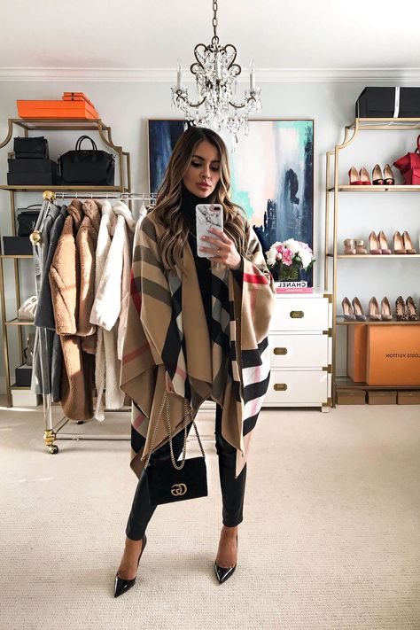 Fashion blogger mia mia mine wearing a burberry poncho for fall. Visit my blog to see more burberry outfits, luxury outfits for women, and poncho outfits for fall. #burberry #womensfashion #lookoftheday Burberry Cape Outfits, Burberry Poncho Outfit, Black Poncho Outfit, Burberry Outfits Women, Poncho Outfit Fall, Burberry Scarf Outfit, Burberry Outfits, Burberry Poncho, Burberry Cape