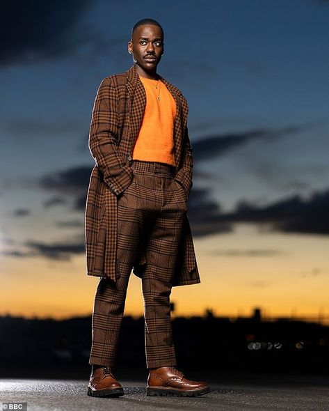 Doctor Who FIRST LOOK: Ncuti Gatwa dons the costume for the first time | Daily Mail Online Doctor Who 60th Anniversary, 15th Doctor, Doctor Who Outfits, Ncuti Gatwa, Orange Jumper, Doctor Who Costumes, Checkered Suit, Colin Baker, Peter Davison