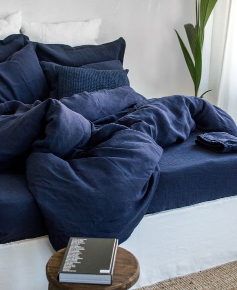 "Take a deep breath of midnight air and rest in comfort with this wonderful midnight blue linen duvet cover. It features natural linen fabric that is especially soft for the skin, highly absorbent, fully breathable that will ensure good night sleep, all year round. Fully breathable, anti-allergic, ultradurable and 100% natural. Handcrafted with care in Lithuania from premium local linen. This midnight blue duvet cover matches perfectly in color with our midnight blue pillowcases, bed sheets, waffle blanket, coverlet selection. Create a bundle to match your own taste and make your bedroom special! DETAILS ✓ Midnight blue color ✓ Custom design ✓ Wooden buttons ✓ Insert's corner ties ✓ Made from 100% natural linen ✓ Stonewashed, naturally softened ✓ Professionally handcrafted in Lithuania SIZ Deep Blue Bed Sheets, Navy Blue Bed Set, Neutral Navy Bedroom, Navy Bedding Aesthetic, Dark Blue Duvet Cover, Green Blue Bedding, Navy Bed Sheets, Blue Bedsheet Aesthetic, Navy Blue Apartment Aesthetic