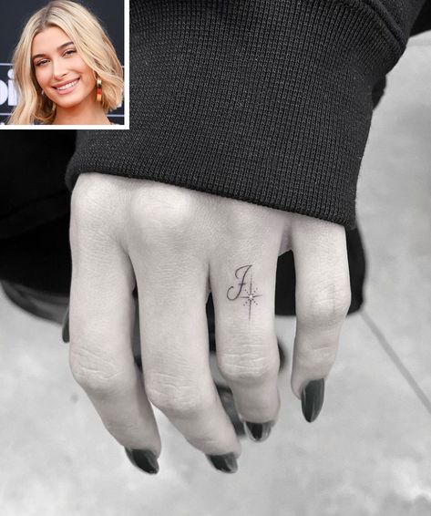 Hailey Baldwin Gets a New Tattoo on Her Ring Finger in Honor of Husband Justin Bieber Wedding Ring Finger Tattoos, Marriage Tattoos, Wedding Band Tattoo, J Tattoo, Tato Henna, Wedding Ring Tattoo, Finger Tattoo For Women, Tattoo Wedding Rings, Hand And Finger Tattoos