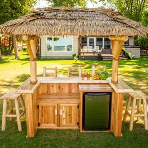 New Tropical Paradise Tiki Bar - Dundalk Leisurecraft Tiki Bars Backyard, Tiki Bar Stools, Tiki Bars Diy, Outdoor Tiki Bar, Pool Side Bar, Thatch Roof, Cabinet Fridge, 2 Door Cabinet, Outside Bars