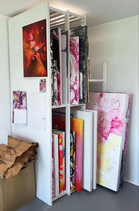 Large Paper Storage Art Studios, Arts And Crafts Studio Ideas, Mural In Art Studio, Pegboard Ideas Art Studio, Art Craft Room Organization, Floor Covering For Art Studio, Art Studio Canvas Storage, Large Canvas Storage, Artist Canvas Storage