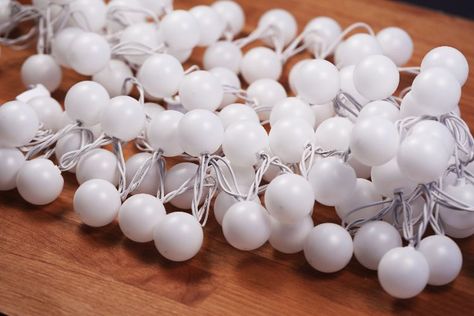 Turn ordinary Ping-Pong balls into lights so beautiful, nobody will believe you made them yourself Ping Pong Lights, White String Lights, Ping Pong Balls, At The Store, Ball Lights, Ping Pong, The Store, String Lights, So Beautiful