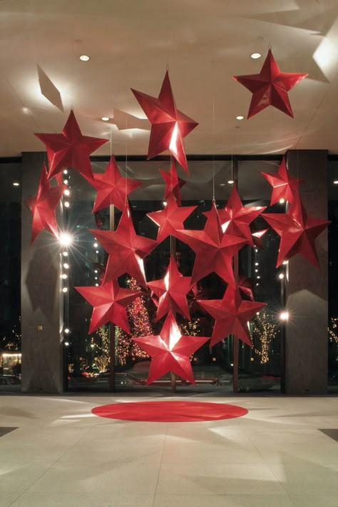 Red And White Christmas Window Display, Venue Christmas Decorations, Christmas Event Decor, Christmas Venue, Christmas Circus, Christmas Window Decor, Christmas Ceiling Decorations, Christmas Themes Decorations, Red Stars