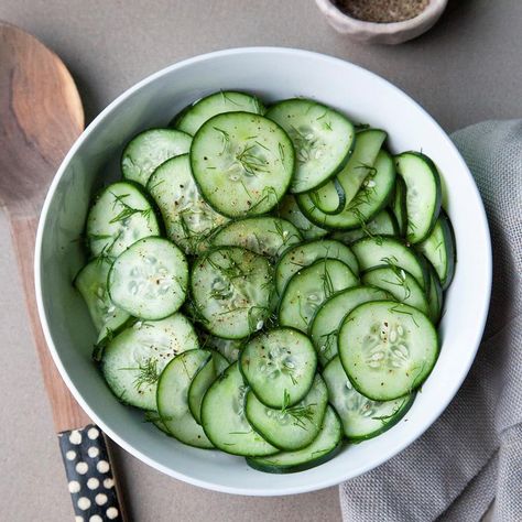 Sprinkling cucumber slices with salt and letting them stand in a colander draws out excess water so they stay crisp when set on a barbecue buffet. Try this cucumber dill salad alongside any grilled entree. —Taste of Home Test Kitchen Filled Cucumbers, Cucumber Dishes, Pansy Cards, Salads For Picnics, Deviled Egg Potato Salad, Dill Salad, Cucumber Dill Salad, Dill Recipes, Baked Scallops