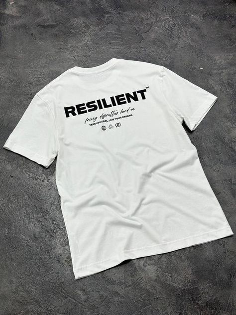 Oversized White Unisex Graphic T-shirt, Resilient Printed Cotton T-shirt T shirt #tshirt t-shirt #t_shirt t shirts #tshirts t-shirts #t_shirts T shirt design #tshirtdesign T-shirt designs #t_shirtdesign T shirts designs #tshirtsdesigns 1.468 Represent T Shirt, Mens Tshirt Designs, Streetwear Tshirt Design Graphics, Graphic T-shirt Design, Modern T Shirt Design, Unique T Shirt Designs, Streetwear Graphics, White Tee Men, Streetwear Tshirt Design