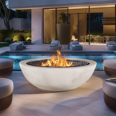 Experience the joy of gathering around a warm fire and create lasting memories with our 25" Propane Gas Fire Pit with Assemblable Tank Cover. Enjoy the simplicity of propane fuel, the beauty of lava rocks, and the convenience of a waterproof cover. Elevate your outdoor entertaining space today! Finish: White | Brayden Studio® Carolgene 13.4" H x 25" W Propane Outdoor Fire Pit Table | 13.4 H x 25 W x 25 D in | Wayfair Outdoor Propane Fire Pit, Fire Rocks, Fire Pit Table Set, Outdoor Gas Fireplace, Glass Fire Pit, Propane Fire Pit Table, Outdoor Kitchen Island, Fire Pit Bowl, Concrete Fire Pits