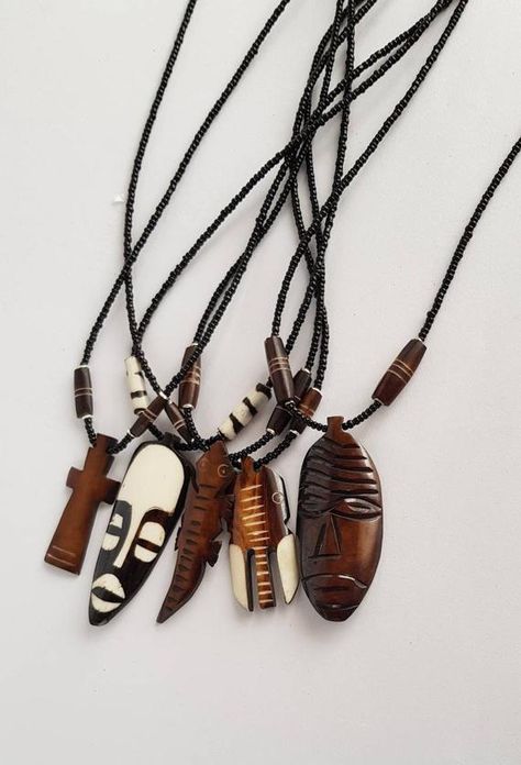 Check out this item in my Etsy shop https://www.etsy.com/uk/listing/647570792/wholesale-african-pendants-african-bone African Necklaces, African Inspired Jewelry, Loc Jewelry, Mask Necklace, Bone Necklace, African Necklace, Bone Pendant, Animal Bones, Handmade Jewelry Necklace