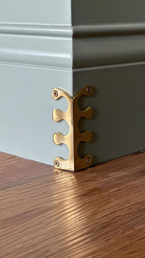 Many years ago, I saw a photo on Pinterest of a brass corner protector affixed to a crisp white baseboard corner, and I knew someday I’d have some for myself. • What’d ya know….dreams do come true lol🤣 • If you’re super worried about breaking your toes then these aren’t for you. • But if you’re into tiny details around your home that make a big impact, then I’ve linked these babies in my LTK for you. • Just click the link in my profile and find the LTK button! • Tag your boujee-est friend! Not White Baseboards, Brass Baseboard Corner, Baseboard Protector, Metal Corner Protectors, Baseboard Corner Protectors, Victorian Baseboards, Baseboard Corner Ideas, Corner Protectors Wall, Brass Corner Protectors