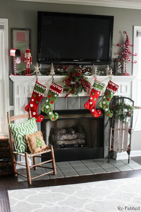 One of the biggest challenges in home decorating is how to decorate your mantel with a TV. This post highlights several different ideas on how to do just that! Must pin to remember this one. How To Decorate Mantle With Tv Above It For Christmas, Christmas Mantle Decor With Tv, Decorating Mantles, Christmas Fireplace Design, Decorating A Mantel, Diy Christmas Fireplace, Christmas Mantles, Christmas Decs, Mantel Ideas