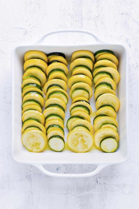 Healthy, simple, and fabulous, this Zucchini and Squash Casserole is the best low-carb recipe for Summer squash! Yellow squash and zucchini are baked in the oven to perfection with a crispy crust made from Parmesan cheese and breadcrumbs. This easy casserole is amazing for Summer picnics and potlucks, and makes the perfect side dish for any holiday dinner! Garlic Parmesan Crockpot, Zucchini And Squash Casserole, Healthy Squash Casserole, Sauteed Zucchini And Squash, Healthy Squash Recipes, Summer Squash Casserole, Zucchini And Squash, Summer Pasta Dishes, Squash And Zucchini