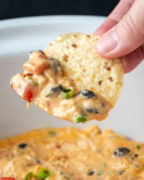 Serve this melty Crock Pot Chicken Nacho Dip as an easy appetizer for dipping, or pour it over chips for cheesy and flavorful chicken nachos! Slow Cooker Nacho Cheese, Chicken Nacho Recipe, Chicken Nacho Dip, Nacho Cheese Recipe, Warm Dip Recipes, Dip Recipes Crockpot, Nacho Recipe, Nachos Cheese Dip, Nacho Dip