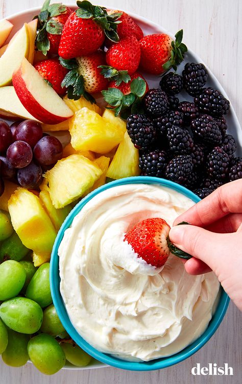 This super-simple dip will make fruit platters waaay more appealing! Get the recipe at Delish.com. #fruit #dip #withcreamcheese #withmarshmallowfluff #homemade #easy #recipe #best #marshmallow #orange Shower Appetizers, Superbowl Desserts, Pizza Sugar Cookie, Fruit Dips Recipes, Healthy Superbowl Snacks, Fruit Dessert Recipes, Easy Dips, Cold Appetizers, Superbowl Snacks