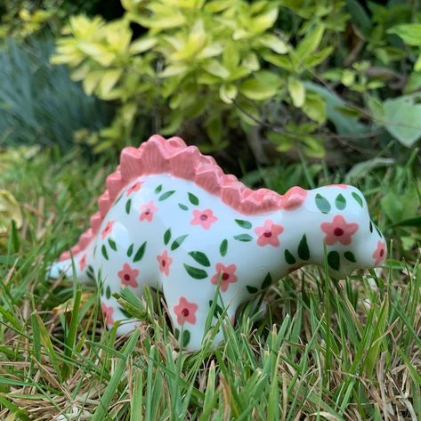 This pink ditsy floral stegosaurus is my personal favourite from my recent Dino drop! ✨🌸🦕🎨 Thank you so much to everyone who placed an order over the weekend! Please check out my website to see which pieces are left 🥰✨🎨 #art #artist #ceramics #pottery #painting #illustrator #ceramicstudio #potterytiktok #potterypainting #painter #dinosaur Ceramic Dinosaur Painting Ideas, Dinosaur Pottery Painting Ideas, Dinosaur Pottery, Ceramic Dinosaur, Diy Pottery Painting, Diy Pottery, Ceramics Pottery, Ceramic Studio, Craft Studio