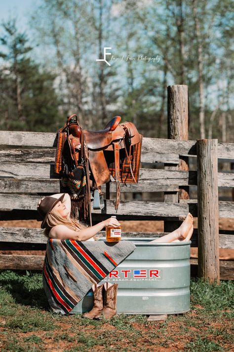 Laze L Farm Photography | Beth Dutton Water Trough | posing in the trough with the whisky bottle Water Trough Photoshoot, Horse Water Trough, Cowgirl Shoot, Western Photo Shoots, Cowgirl Photography, 22nd Bday, Horse Trough, Boudiour Poses, Cowgirl Photoshoot