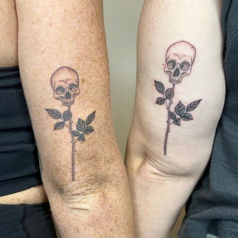 @sailorose_ on Instagram: "Matching skull flowers for these sisters! 💀🥀✨ . . . . . . . . . . . . . #tattoo #tattooideas #matchingtattoos #skull #skulltattoo #microtattoo #smalltattoo #cutetattoo #fineline #finelinetattoo #dallastattooartist #girlswithtattoos #blackandgraytattoo" Goth Friendship Tattoos, Bff Skull Tattoos, Edgy Couples Tattoos, Skull Friendship Tattoos, Scary Best Friend Tattoos, Weird Sister Tattoos, His And Her Skull Tattoos, Alternative Best Friend Tattoos, Matching Skull Tattoos Best Friends