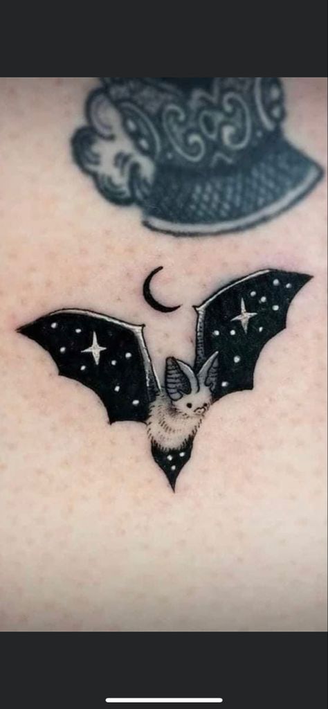 Cute star bat tat Galaxy Bat Tattoo, Spooky Wrist Tattoos For Women, Bat Tattoos Cute, Bats And Stars Tattoo, Bat Halloween Tattoo, Cute Bat Tattoo Ideas Small, Bat And Stars Tattoo, Mini Bat Tattoo Ideas, Star Wings Tattoo