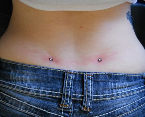 dermal piercings..Done by Shilow Nyholm@ Ink My Body Tattoos Piercings Body Private, Types Of Dermal Piercings, Dermals On Chest, Dermal Body Piercings, Body Dermal Piercing, Back Dermals Black Women, Hip Piercings Dermal, Dermal Piercing Tattoo, Dermal Back Piercings