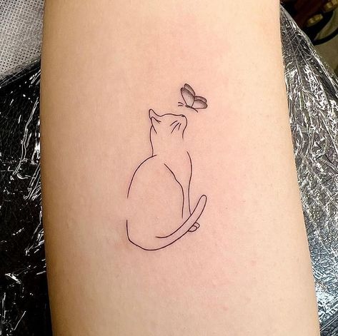 Feline Tattoo Ideas, Cat Tattoo Memorial Simple, Cat Playing With Butterfly Tattoo, Mom And Daughter Cat Tattoos, Lost Pet Tattoo Cats, Cat Tattoo With Name, Fine Line Cat Tattoo Ideas, Personal Cat Tattoo, Memorial Tattoo For Cat