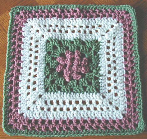 Canadian Spring Free Crochet Square Pattern 12 Inch. By Janette Atwell Materials Size H hook or size needed for gauge 3 colours Worsted Weight Acrylic Yarn: Colour A: Rose Colour B: Green Colour C: White Free Pattern More Patterns Like This! Free Crochet Square, Hekel Patrone, Crochet Kingdom, Crochet Squares Afghan, Crochet Granny Square Afghan, Crochet Granny Square Blanket, Crochet Blocks, Crochet Quilt, Crochet Lessons