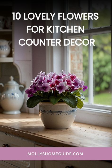 Discover the best flowers for kitchen decor to effortlessly brighten up your space. Elevate your home with beautiful blooms and fresh house plants that will add a touch of nature to your kitchen. Learn how to style your kitchen counter or island with these simple yet stunning floral arrangements. Don't forget to make homemade flower food or use flower preservatives to help your flowers last longer. Whether you prefer decorating with real flowers or faux ones, these ideas will inspire you to crea Kitchen Flower Arrangements Countertops, Kitchen Flower Arrangements, Homemade Flower Food, Kitchen Arrangement, Flowers Last Longer, Kitchen Plants, Different Types Of Flowers, Best Flowers, Kitchen Counter Decor