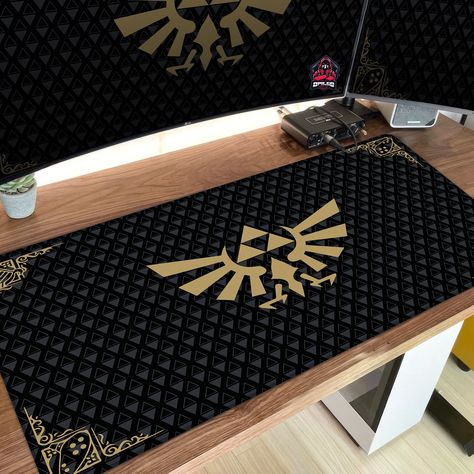 "Black Zelda Logo Desk Mat, Zelda Bordered Gaming Large Desk Mat, Zelda Symbol Player Desk Mat Decor, Gift 🌟 PRODUCT DETAILS 🌟 * Made from high-quality neoprene material for enhanced comfort and durability * Non-slip rubber bottom ensures the mat won't slide while in use, offering a stable and reliable surface * The product is sewn around the edges, making it durable and longer-lasting * We use thermal transfer printing to produce vibrant, long-lasting prints * Multifunctional use: The supportive surface makes it great for computer use, gaming, writing, typing, or crafting * Perfect Gift Idea: Our unique and stylish mousepads and desk mats make great gifts for Father's or Mother's Day, birthdays, anniversaries, or as thoughtful presents for your loved ones, friends, and colleagues.\" 🌟 Zelda Room Decor, Black Zelda, One Piece All Characters, Zelda Room, Zelda Logo, Gaming Desk Mat, Room Stuff, Large Desk, Gaming Desk