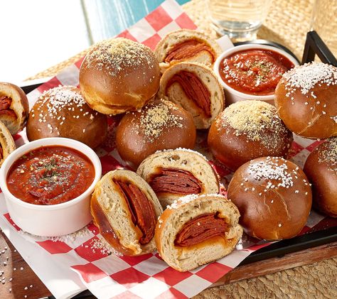 Pass on the takeout pizza for movie night and put the stale pretzels away for game day. These pepperoni-stuffed, soft-baked pretzel bombs will get rave reviews at your next gathering or mealtime. Feed your hungry family and friends a fusion of their favorite foods with sauce for dipping and cheese for topping -- all wrapped up in an easy-to-eat package! From The Pretzel Co. Things To Eat For Dinner, Quick Easy Appetizers, Baddie Pfps, Substitute Ingredients, Fun Foods To Make, Soft Pretzel, Usa Food, Kawaii Cooking, Food Fantasy