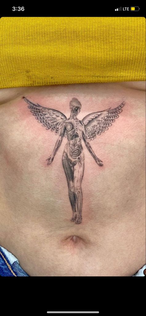 Nirvana Chest Tattoo, Center Stomach Tattoos, In Utero Angel Tattoo, Nirvana Angel Tattoo, Nirvana Angel, In Utero Tattoo, Angel Back Tattoo, Angle Tattoo, Scar Cover Up