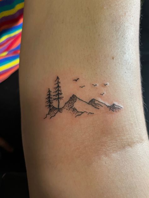 Life’s A Climb Tattoo, Small Mountain Tattoo Wrist, Outdoorsy Tattoos Women, Pnw Mountain Tattoo, Women’s Nature Tattoos, Mountain Tattoo With Trees Simple, Small Mountain Tattoos For Women Forearm, Nh Tattoo Ideas, Small Alaska Tattoo Ideas