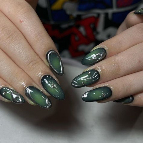 Cool Green Acrylic Nails, Emerald Green Celestial Nails, Green Nails With Silver Accent, Black Green And Silver Nails, Dark Green Nails With Gems, Green Alt Nails, Nails With Dark Green Dress, Acrylic Nail Designs Dark, Dark Green Nails With Chrome