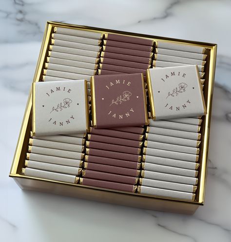 50 Wedding Chocolate Favors, Gold or Silver Foil Milk Chocolate, Wedding Favors, Party Favors, Wedding Gift, Luxury Chocolate ⓘ About the Item ▪ Chocolate Size : 4x4 cm (1.58" x 1.58"), Weight: 7 gram (0.21 oz) ▪ Fresh Milked Chocolate ▪ Gold, Silver Foil ▪ Chocolates can be consumed safely within 1 year. ▪ Once you receive your order, do not store it in the refrigerator. Store in a cool and dry environment between 16 - 20oC, away from sunlight. Indulge in the perfect blend of luxury and persona Wedding Guest Gifts Party Favors, Wedding Chocolate Favors, Wedding Favours Luxury, Candle Wedding Gift, Chocolate Wedding Favors, Party Favors Wedding, Chocolate Wedding, Party Favors For Adults, Wedding Chocolate