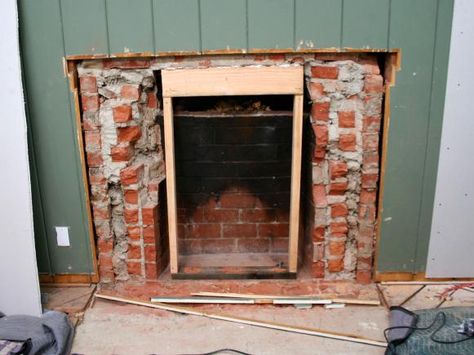 Removing a Brick Fireplace | Interior Design Styles and Color Schemes for Home Decorating | HGTV How To Remove Brick Fireplace, How To Remove A Fireplace, Closed Off Fireplace Ideas, Fireplace Removal, Fireplace Alternatives, Removing Fireplace, Brick Fireplace Decor, Fireplace Interior, Brick Fireplace Wall