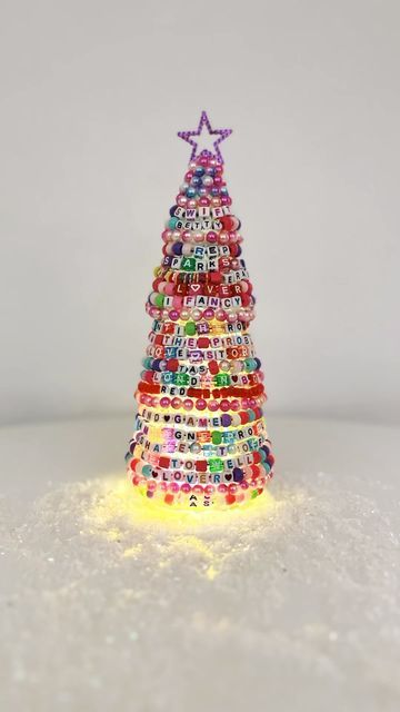 415K views · 24K likes | FINDS FOR PEANUTS on Instagram: "DIY Swiftmas Tree! Had so much fun making this and oh how she shines! #taylorswift #swiftie #swifties" Taylor Swift Tree Ideas, Swiftmas Tree Ideas, Friendship Bracelet Christmas Tree, Diy Taylor Swift Ornaments, Christmas Diy Aesthetic, Christmas Crafts Aesthetic, Aesthetic Christmas Diy, Swiftmas Tree, Taylor Swift Christmas Tree